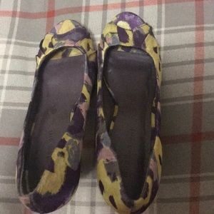 Yellow and purple heels